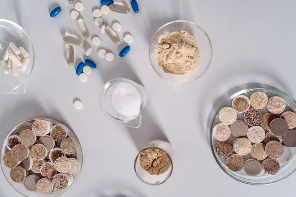 The Art of Drawing Readers In: Your attractive post title goes here High-angle shot of various pharmaceutical ingredients and pills on a white surface. Ideal for healthcare and science themes.